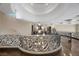 Elegant home foyer with ornate staircase, chandelier, and hardwood flooring at 9301 Verlaine Ct, Las Vegas, NV 89145