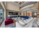 Expansive living room boasts soaring ceilings, stylish decor, and a seamless flow to other living spaces at 9301 Verlaine Ct, Las Vegas, NV 89145