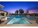 Resort-style pool and spa area offers a relaxing retreat with lounge chairs and mature landscaping at 9301 Verlaine Ct, Las Vegas, NV 89145
