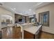 Modern wet bar with counter seating in stylish open-concept living area at 9301 Verlaine Ct, Las Vegas, NV 89145