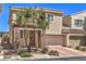 Charming two-story home with a well-maintained yard and two-car garage in a quiet neighborhood at 9326 Noble Sage Ave, Las Vegas, NV 89148