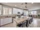 Spacious kitchen with granite countertops, stainless steel appliances, and island seating at 9326 Noble Sage Ave, Las Vegas, NV 89148