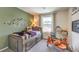 Charming bedroom with rustic decor, featuring a twin bed and natural-themed accents at 9334 Soothing Sea St # Lot 91, Las Vegas, NV 89178