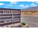 Litchfield & Windham community sign near desert landscape and mountains at 9590 Smiley Creek St, Las Vegas, NV 89178