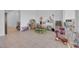 Bright playroom features a large open space, tile floors, and a playful atmosphere at 9590 Smiley Creek St, Las Vegas, NV 89178