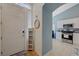 Inviting foyer with a coat closet leading into the bright kitchen at 9724 Canyon Walk Ave, Las Vegas, NV 89147