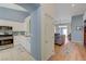 Open-concept kitchen seamlessly flows into a cozy living area at 9724 Canyon Walk Ave, Las Vegas, NV 89147