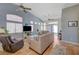Light-filled living room with high ceilings, comfortable seating, and access to the backyard at 9724 Canyon Walk Ave, Las Vegas, NV 89147