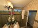 Modern bathroom showcasing a glass shower enclosure, double sink vanity and tile walls at , North Las Vegas, NV 89031