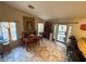 Dining room area with wood table set, hutch, and access to the exterior patio at , North Las Vegas, NV 89031
