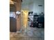 Hallway featuring tile flooring, neutral wall color, and decorative accents and artwork at , North Las Vegas, NV 89031
