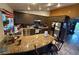 Kitchen with granite countertops, stainless appliances, dark cabinetry, and access to dining area at , North Las Vegas, NV 89031