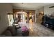 Spacious living room showing tile flooring and an open layout to dining and kitchen spaces at , North Las Vegas, NV 89031