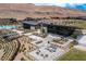 A modern community center with a pool, fitness center, and outdoor seating, perfect for social gatherings at 10752 Patina Hills Ct, Las Vegas, NV 89135