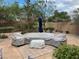 This backyard features a covered outdoor seating area, perfect for relaxing or entertaining guests at 1091 Casa Palermo Cir, Henderson, NV 89011