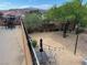 Spacious backyard with string lights, desert landscaping and patio areas at 1091 Casa Palermo Cir, Henderson, NV 89011