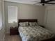 Inviting bedroom with ceiling fan, window blinds, and neutral color scheme at 1091 Casa Palermo Cir, Henderson, NV 89011