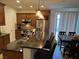 Well-equipped kitchen featuring granite countertops, stainless steel appliances, and wood cabinetry at 1091 Casa Palermo Cir, Henderson, NV 89011