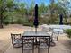 This patio features a dining table and chairs, providing ample space for outdoor entertaining at 1091 Casa Palermo Cir, Henderson, NV 89011