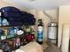 The storage area contains cushions, cleaning supplies, tools, and mechanical equipment at 1091 Casa Palermo Cir, Henderson, NV 89011