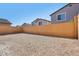 Backyard with block wall offers a blank canvas for creating an outdoor oasis at 10933 Sageview Ave, Las Vegas, NV 89166
