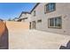 The backyard area is spacious with a block wall, ready to design an outdoor living space at 10933 Sageview Ave, Las Vegas, NV 89166