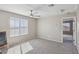 An empty bedroom featuring a window, ceiling fan, and carpeted floors at 10933 Sageview Ave, Las Vegas, NV 89166