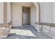 Charming front entryway features stone accents and a welcoming covered porch at 10933 Sageview Ave, Las Vegas, NV 89166