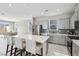 Bright kitchen with a spacious island and stainless steel appliances at 10933 Sageview Ave, Las Vegas, NV 89166