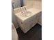 Bathroom sink with white vanity, chrome faucet, toilet and tiled countertop at 1472 Creslow Ct # 101, Las Vegas, NV 89102