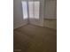 Bedroom features carpet flooring and a mirrored closet at 1472 Creslow Ct # 101, Las Vegas, NV 89102