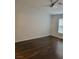 Bedroom with hardwood floors and a modern ceiling fan at 1472 Creslow Ct # 101, Las Vegas, NV 89102