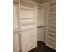 Spacious walk-in closet features custom white shelving and ample storage space at 1472 Creslow Ct # 101, Las Vegas, NV 89102