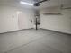 Spacious garage with an epoxy floor, and water heater at 1472 Creslow Ct # 101, Las Vegas, NV 89102