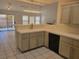 Open-concept kitchen with modern lighting and stainless steel dishwasher at 1472 Creslow Ct # 101, Las Vegas, NV 89102