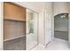 Bathroom view showcasing a closet and shower at 1563 Cattle Ranch Pl, Henderson, NV 89002