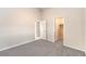 Bedroom featuring carpeted floors and neutral tones at 1563 Cattle Ranch Pl, Henderson, NV 89002