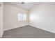 Bedroom with natural light, a neutral palette, and cozy carpeted floors at 1563 Cattle Ranch Pl, Henderson, NV 89002