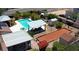 Outdoor oasis features a sparkling pool, covered seating area, bocce ball court, and lush landscaping at 197 Ebb Tide Cir, Las Vegas, NV 89123