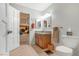 Bathroom with a single sink vanity, tile floors, and a view into the hallway at 197 Ebb Tide Cir, Las Vegas, NV 89123