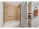 Tiled bathroom with shower/tub combination and grab bar for safety at 197 Ebb Tide Cir, Las Vegas, NV 89123