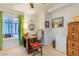 Bedroom with a ceiling fan, large window, and small workspace at 197 Ebb Tide Cir, Las Vegas, NV 89123