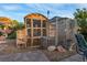 Charming backyard chicken coop with a secure enclosure, adding character to the outdoor space at 197 Ebb Tide Cir, Las Vegas, NV 89123