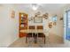 Cozy dining area featuring wood-look floors and vintage decor at 197 Ebb Tide Cir, Las Vegas, NV 89123