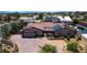 Charming home with a well-manicured front yard, brick driveway, desert landscaping, and solar panels at 197 Ebb Tide Cir, Las Vegas, NV 89123