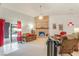 Inviting living room featuring a brick fireplace, sliding glass doors to the backyard and comfortable seating at 197 Ebb Tide Cir, Las Vegas, NV 89123