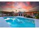 Large swimming pool with a covered patio area for entertaining guests at 197 Ebb Tide Cir, Las Vegas, NV 89123