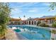 A stunning backyard swimming pool surrounded by lush greenery, creating a private oasis at 197 Ebb Tide Cir, Las Vegas, NV 89123