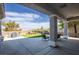 This is a backyard that is covered and set up with outdoor seating at 2099 Mountain City St, Henderson, NV 89052
