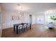 Elegant dining room with modern lighting and ample space for entertaining at 2099 Mountain City St, Henderson, NV 89052